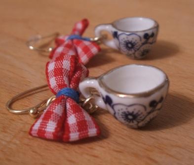teeny tiny teacup earrings on table